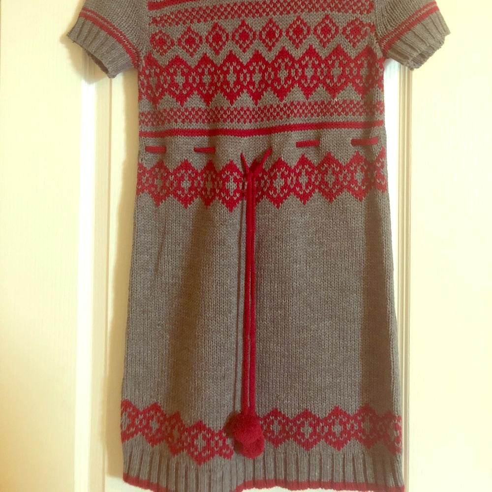 Large gray and red turtleneck dress w/ pompoms